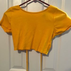 orange/yellow open back shirt